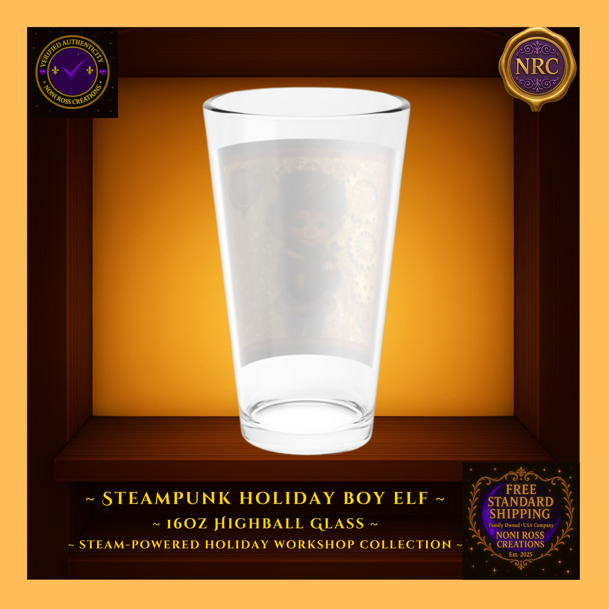 Back view of Steam-Powered Boy Elf 16oz highball glass in NRC cubby, showing plain glass back and Noni Ross Creations branding area.