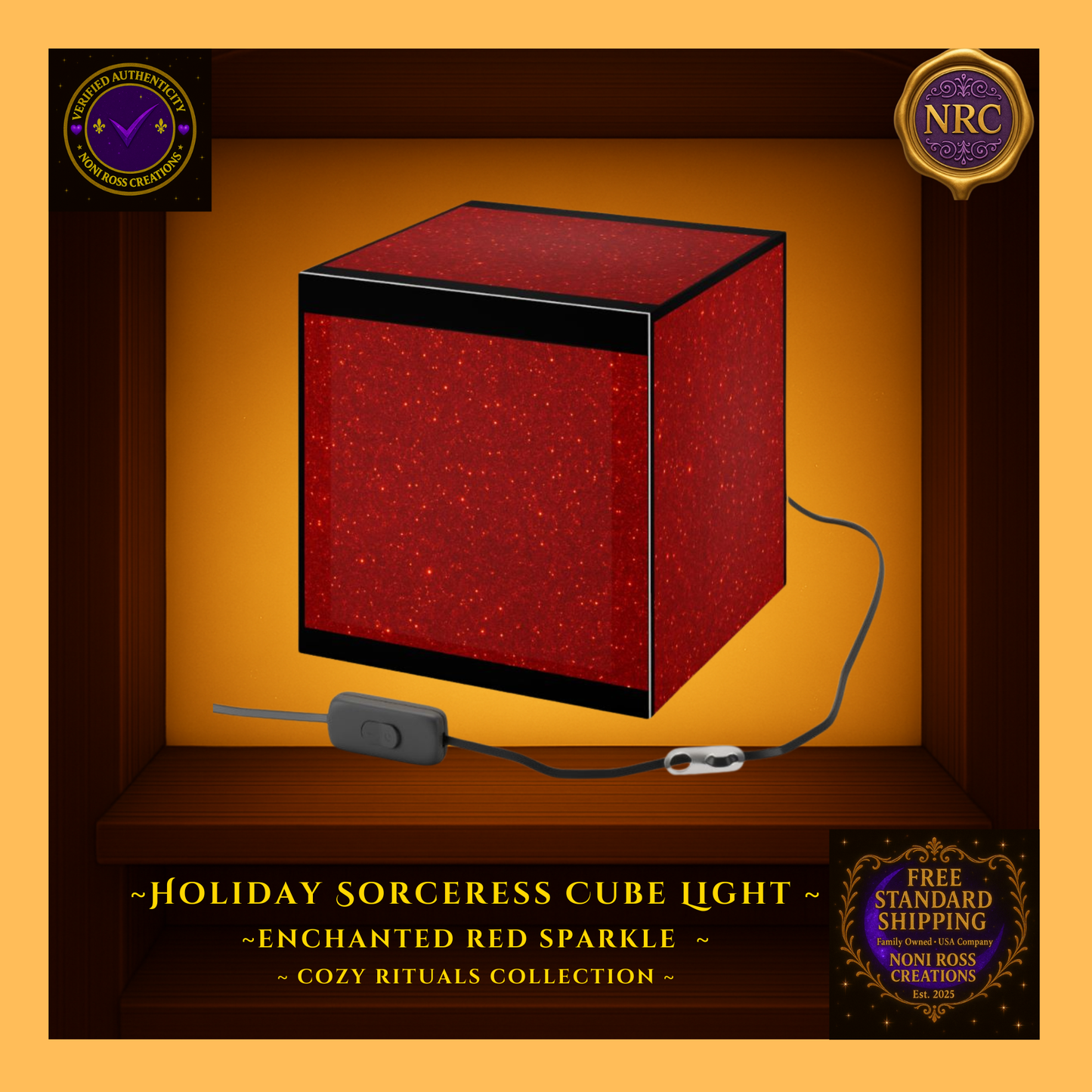 Bottom view of the Holiday Sorceress Cube Light in a gold cubby display showing the red sparkle finish and clean black trim edges