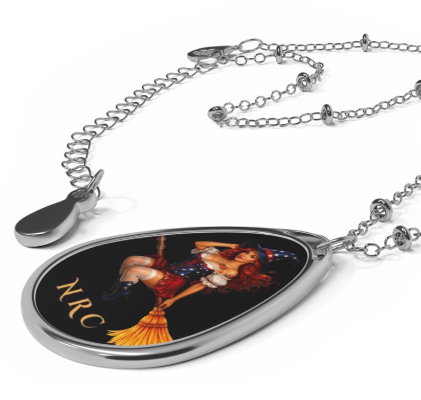 Close up of NRC witch pendant necklace showing glossy artwork detail and teardrop shape