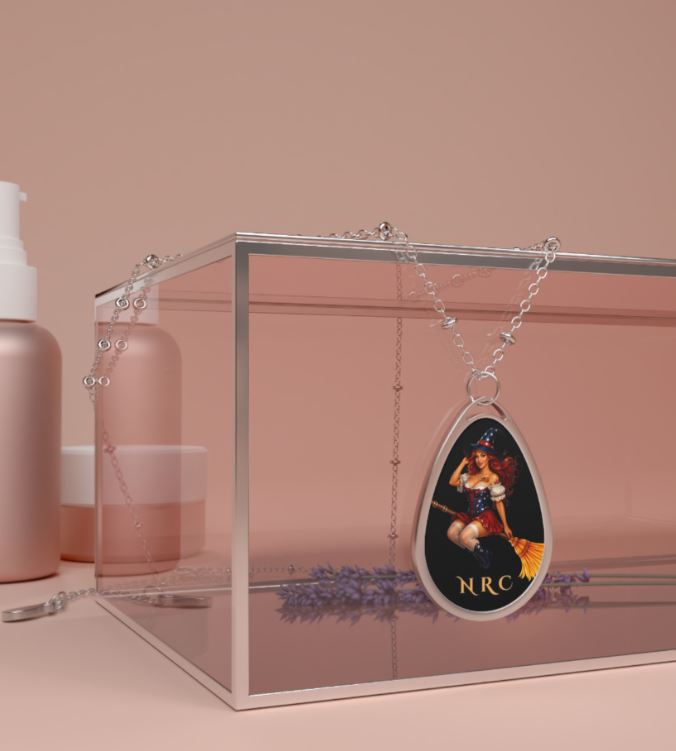 NRC pendant necklace worn in lifestyle setting highlighting witch design and elegant silver chain
