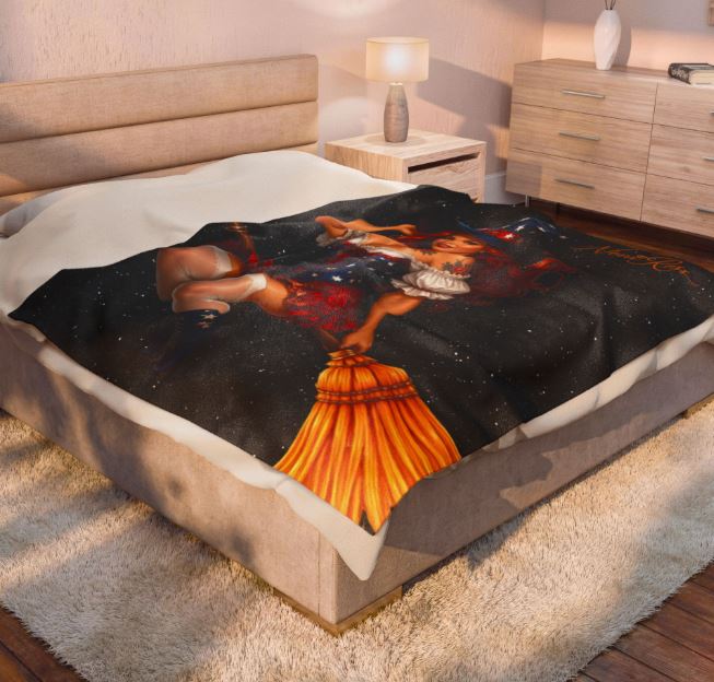 cozy firework night blanket with patriotic witch design folded on chair in living room setting