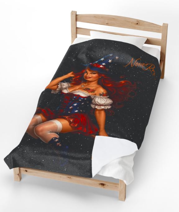 close up of velveteen blanket texture showing vibrant patriotic witch print and soft fabric detail
