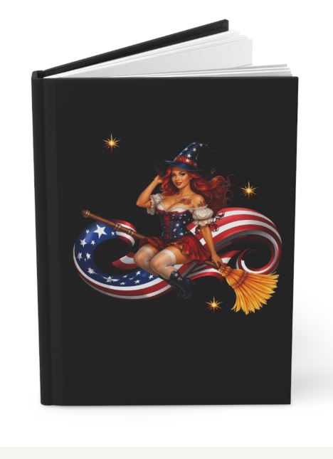 Hardcover journal displayed on desk with patriotic witch artwork and premium matte finish