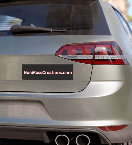 NoniRossCreations promotional car magnet displayed on vehicle showcasing website branding and mobile advertising