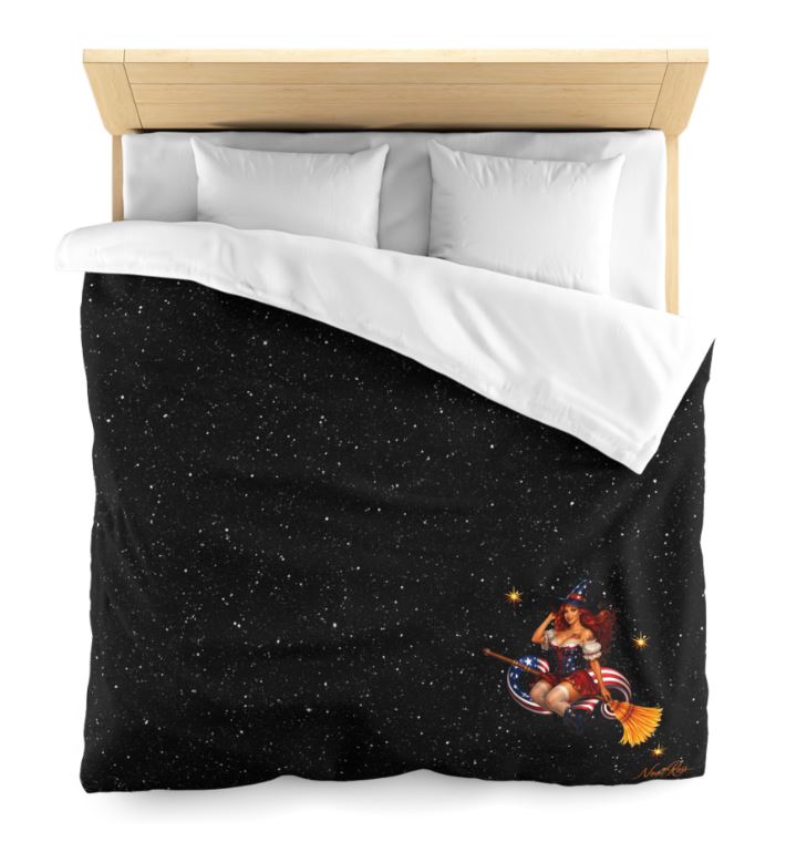 Close-up of minimalist pinup witch bedding showing detailed Noni character on black celestial Queen duvet cover