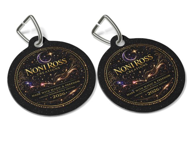 Double-sided pet collar tag showing identical celestial design on both sides with metal clip attachment