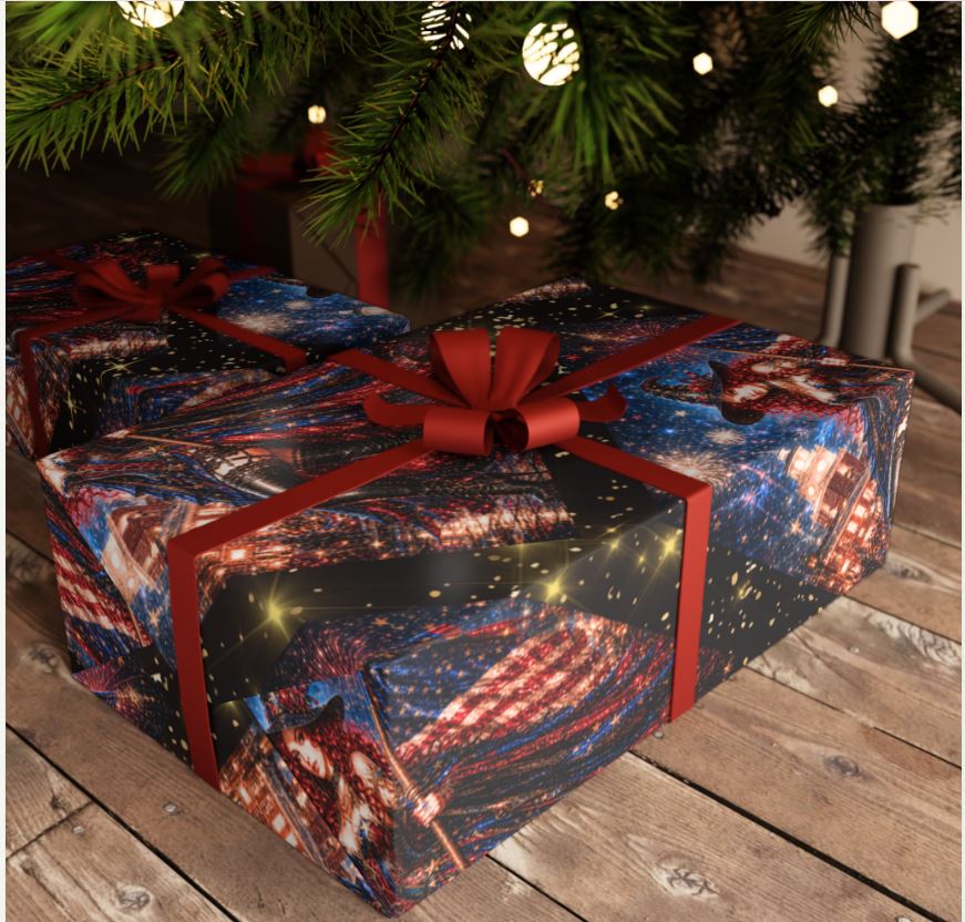 Premium holiday gift wrapped in patriotic fireworks wrapping paper under decorated tree with warm lighting